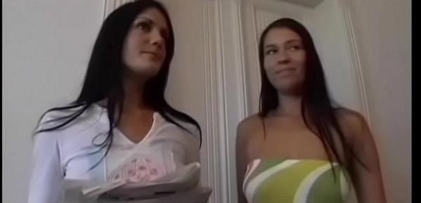  Two sexy brunette co-eds are joined by three dudes for a fuckfest